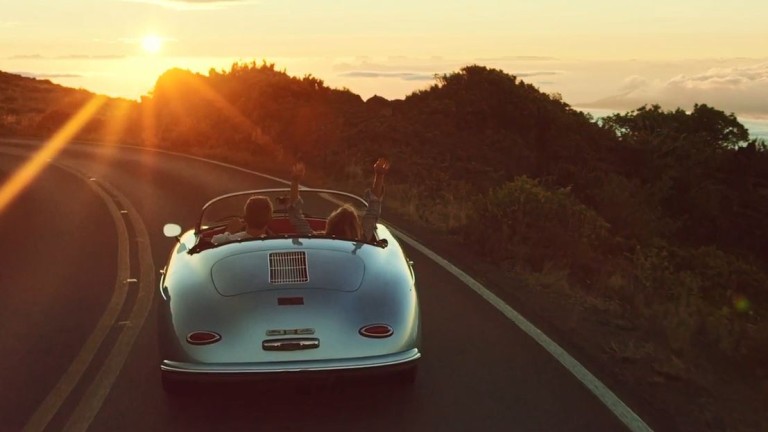 Gelişim Car driving into the sunset
